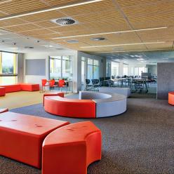 Social spaces separate open-plan learning areas 